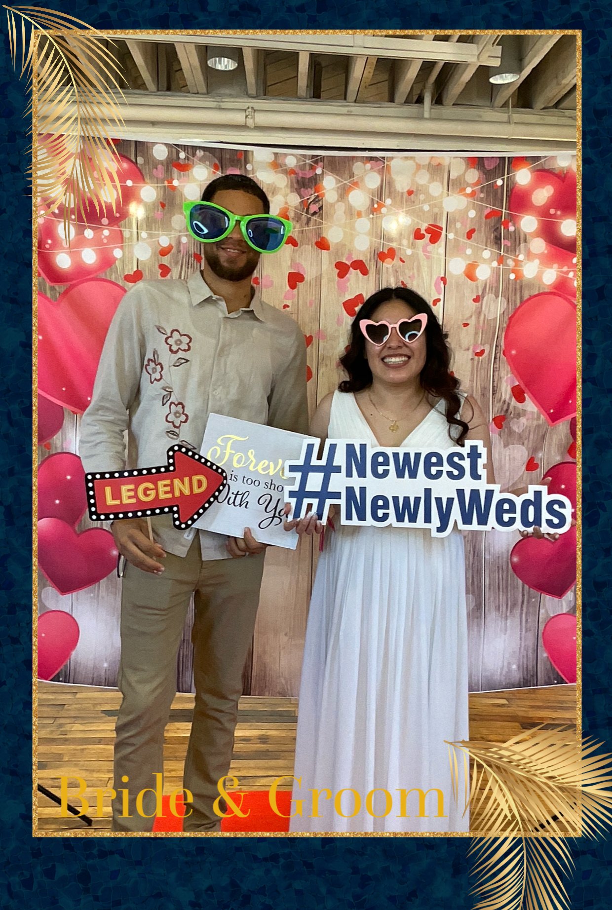 Guests striking a pose inside a MYB Events photo booth